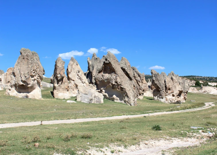 the rocks look like they have heads on them