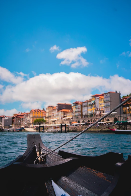 a small fishing boat is docked on the water