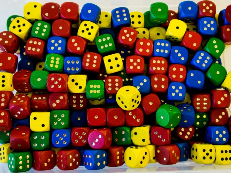 a pile of wooden dices sitting next to each other