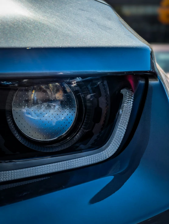 an image of a close up of the front grill on a blue car