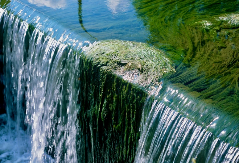a flowing waterfall that has many different streams