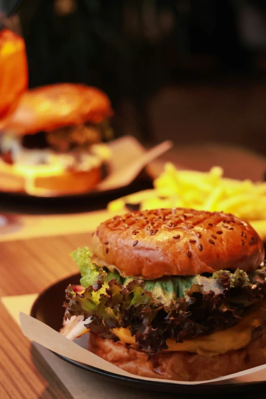 a cheeseburger on a plate and french fries