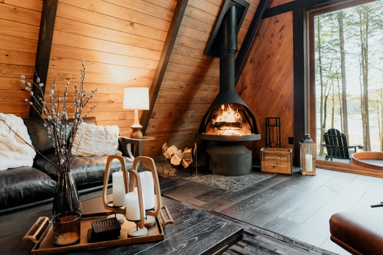 an open living room with a big fireplace