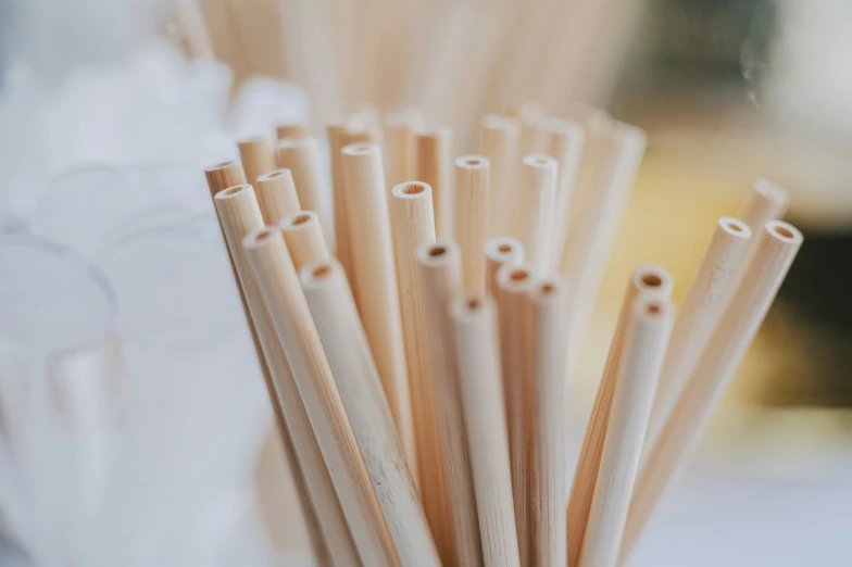 a close up view of many wooden sticks