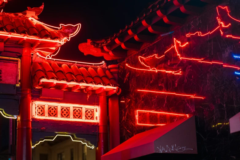 lights decorate a building in the dark sky