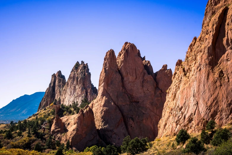 tall, rocky formations with trees on them