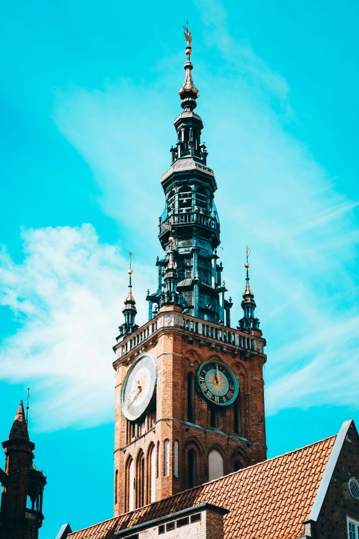 an ornate clock tower with a sky background