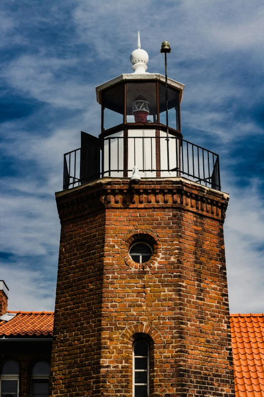 a very tall tower like structure with a clock on top