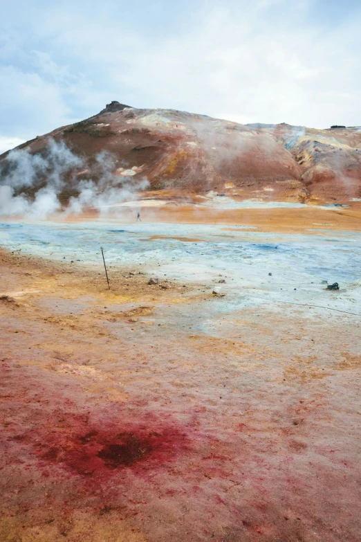 a very small crater with some pink substance