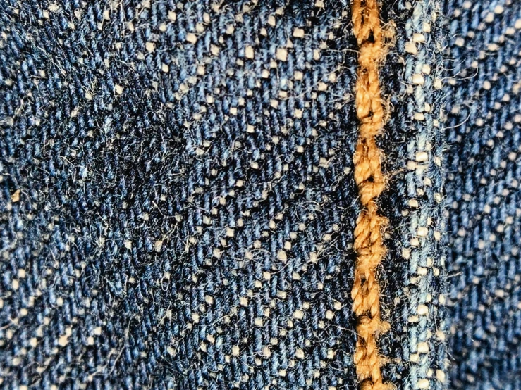 a fabric texture with gold and blue streaks