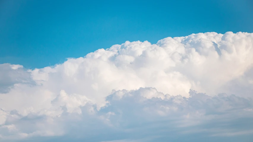 the white clouds are in the blue sky