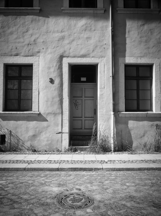 a black and white po of an old building