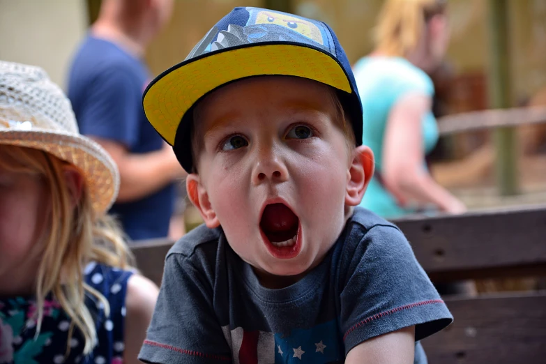  at a zoo with his tongue out