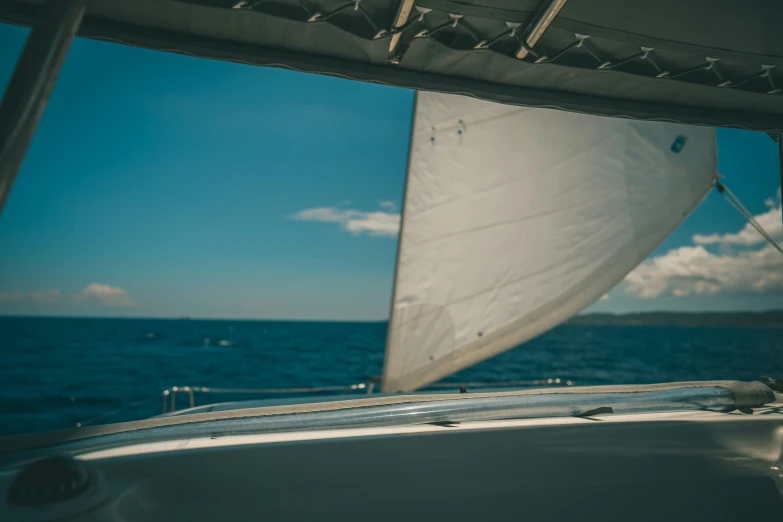 a sailboat sailing on a large body of water