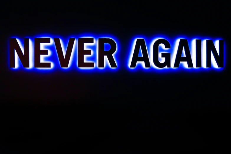 a blue sign that says never again above it