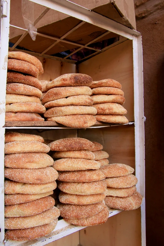 lots of breads stacked on top of each other