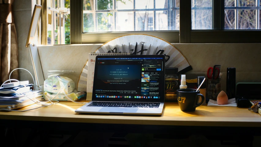 a computer sitting on top of a wooden desk