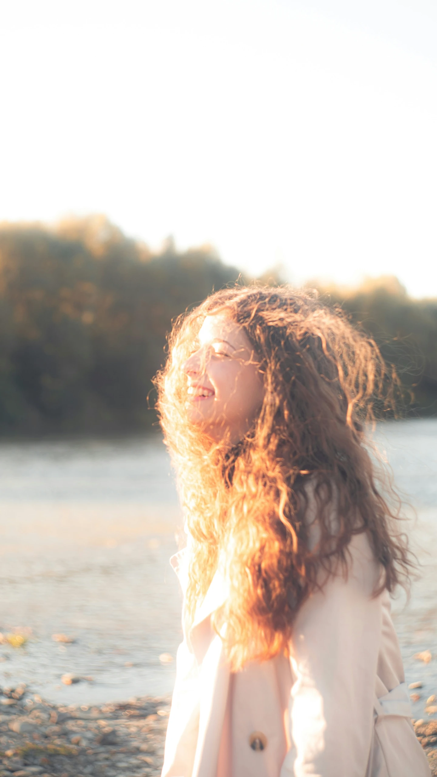 a woman looking into the sky with an artistic expression on her face