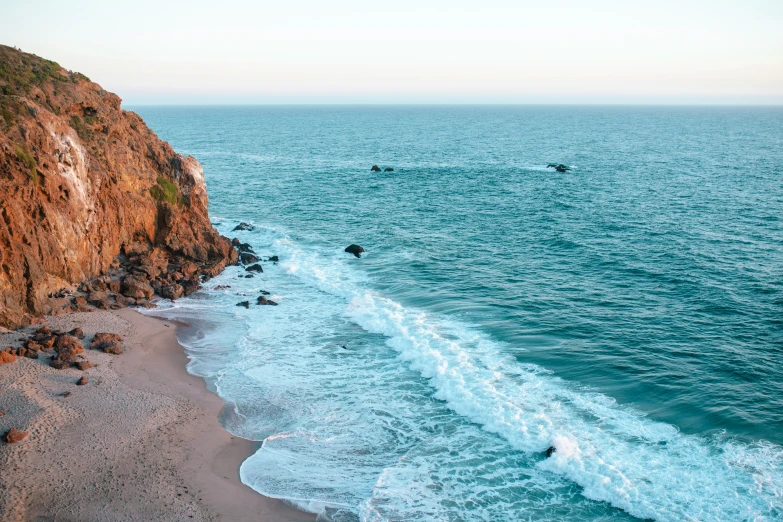 an aerial view of the beach from above