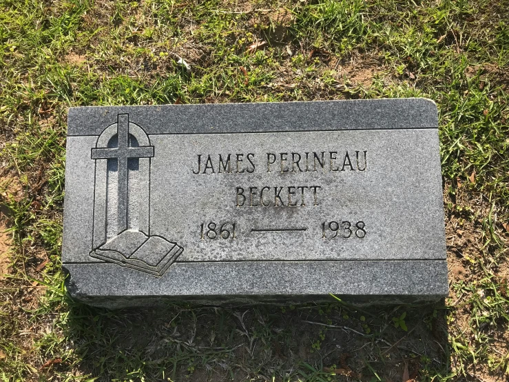 a grave marker with a drawing of a baseball bat on it