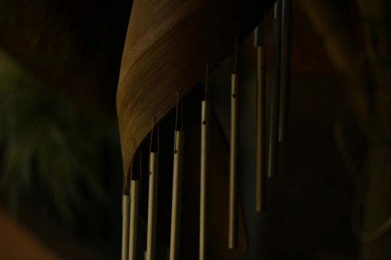 a closeup s of several wooden bars hanging from a wall