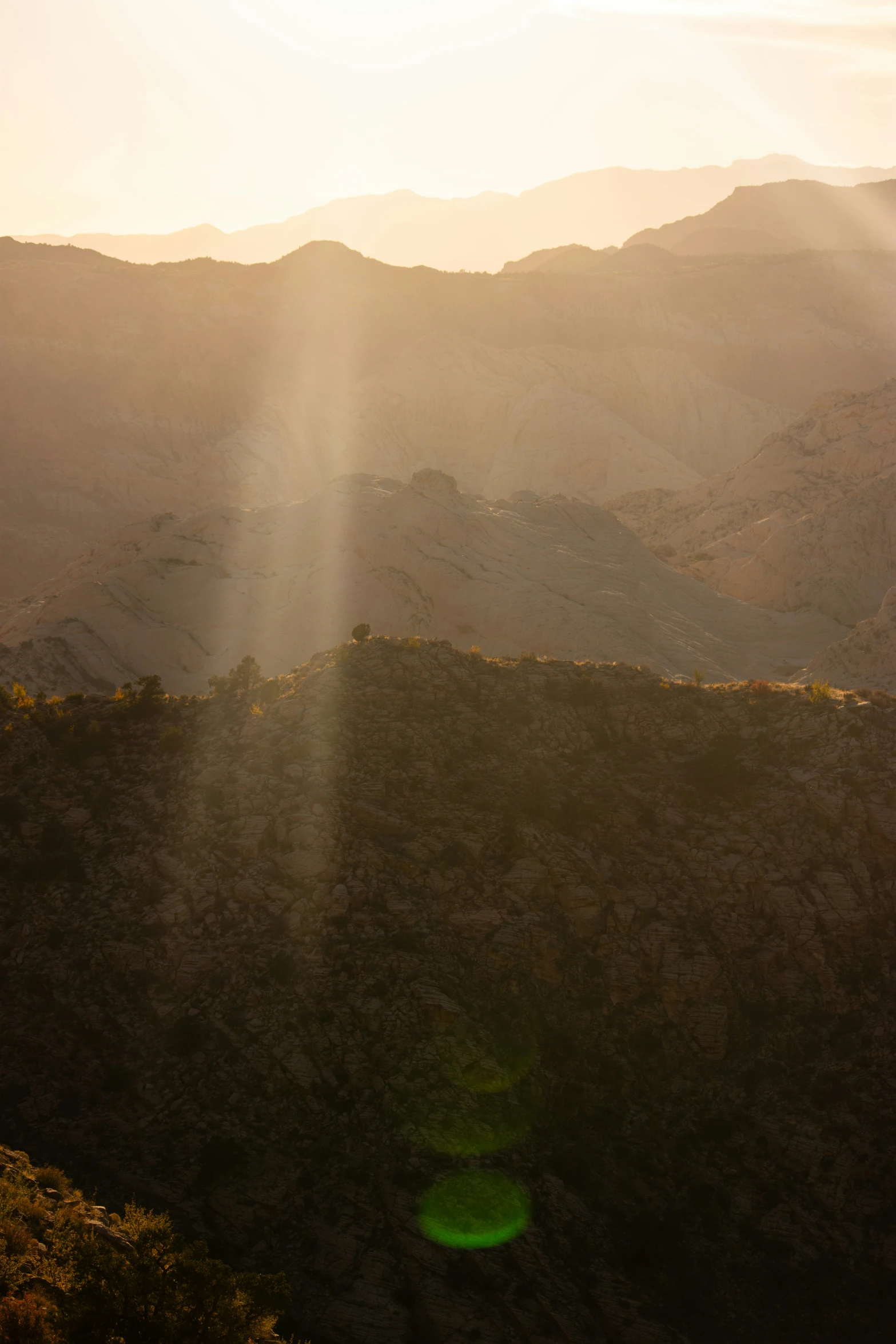 the light is shining in the background over mountains