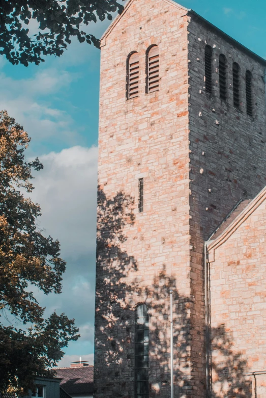 the side view of an old brick church