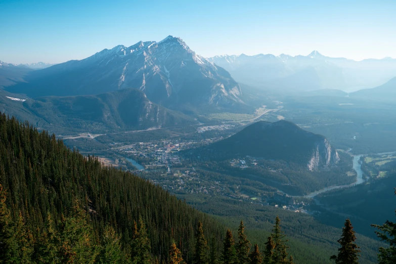 mountain view with buildings and trees at below