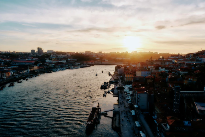 the sun shines bright as people paddle on boats on a river