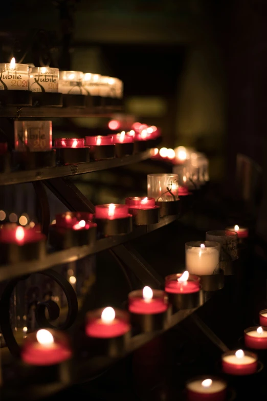 some candles and candles sitting next to each other