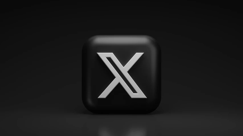 an x icon sitting on top of a black and white table