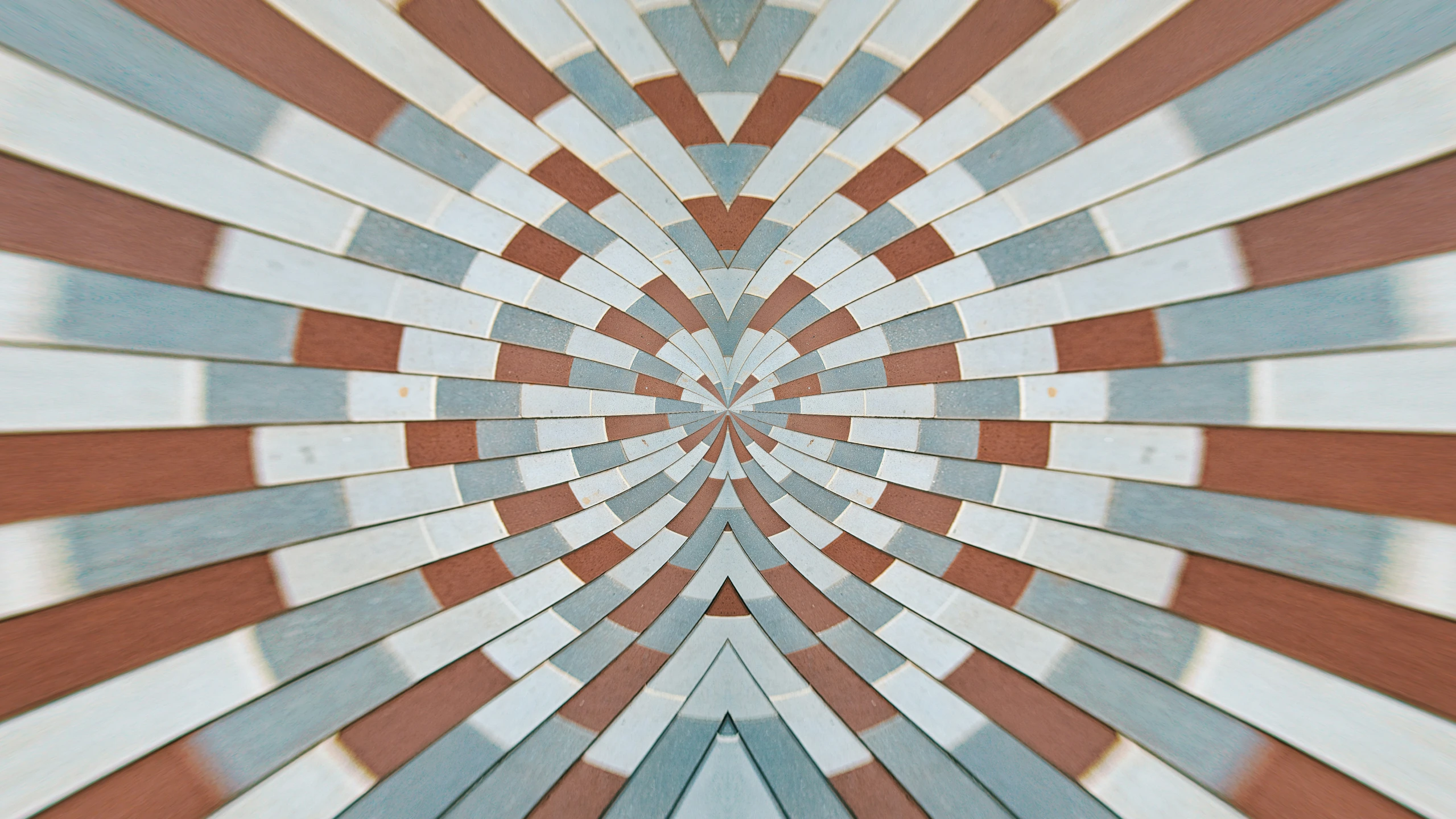 an abstract picture with a geometric pattern in orange, gray and white