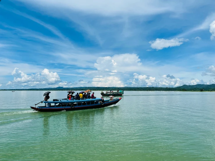 there are many people on the boat that is anchored