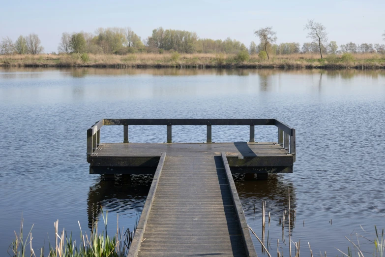 the dock is empty and still in the water