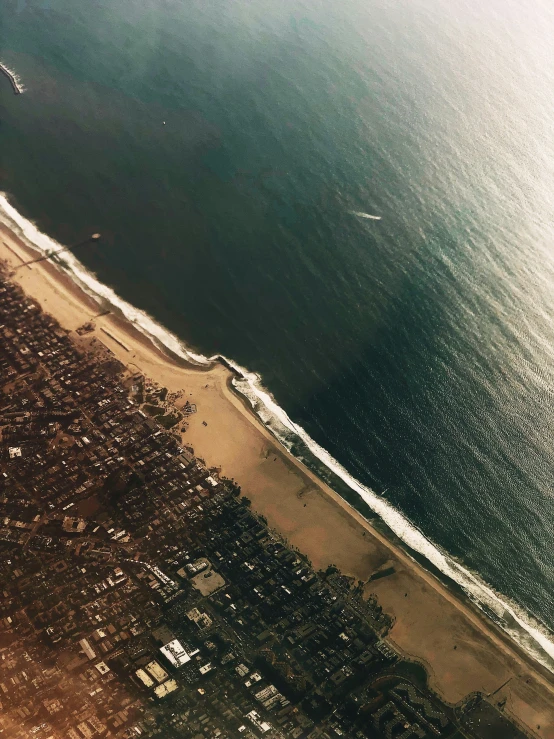 an aerial s of the beach and ocean