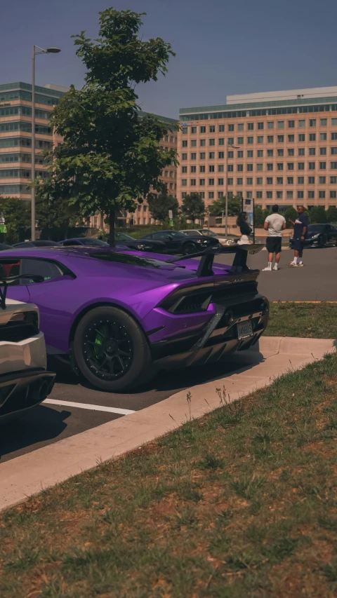 a car parked next to another sports car