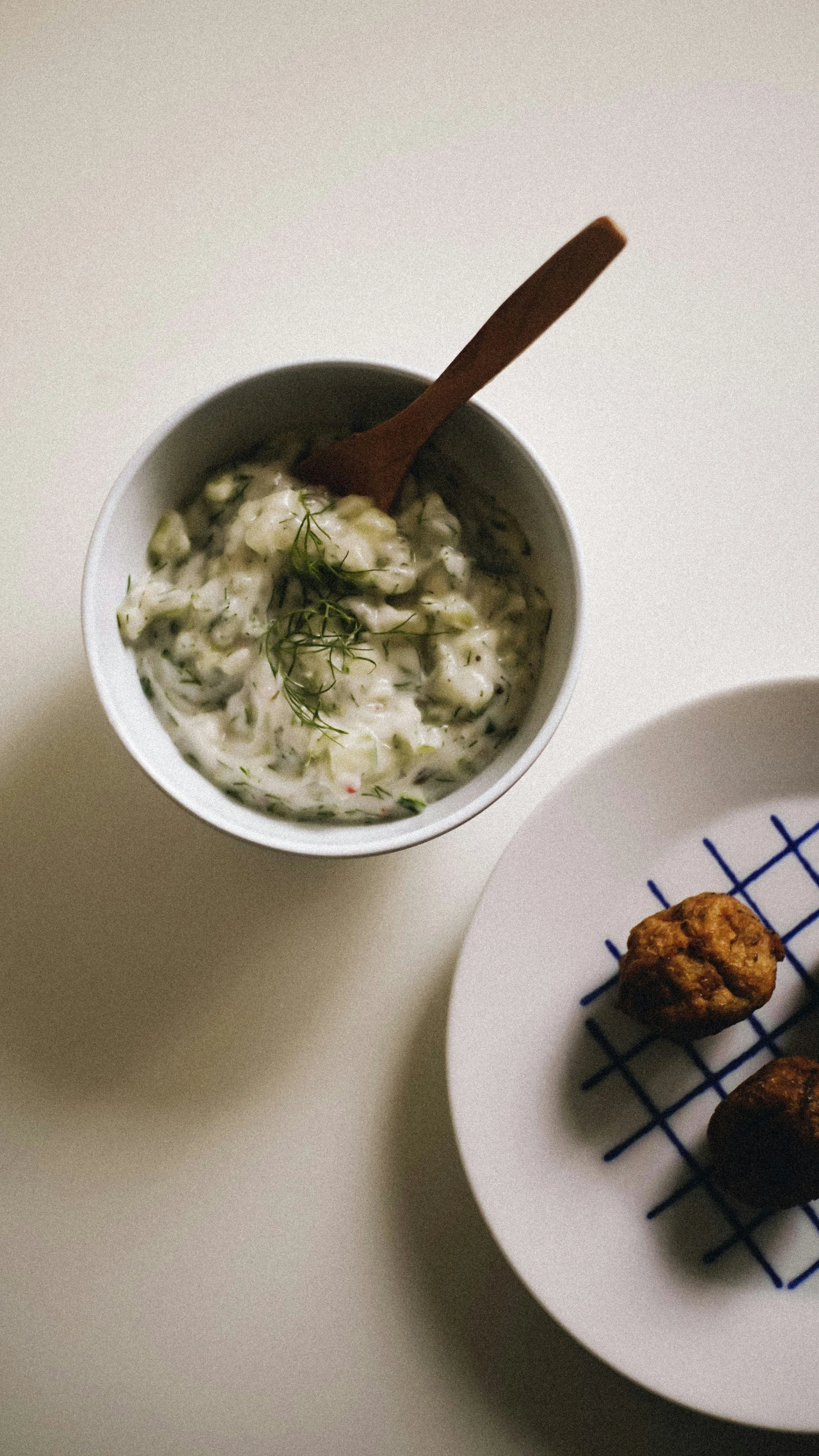 some food that is sitting on a white plate