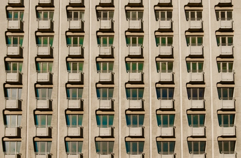 a tall building with several windows on the sides