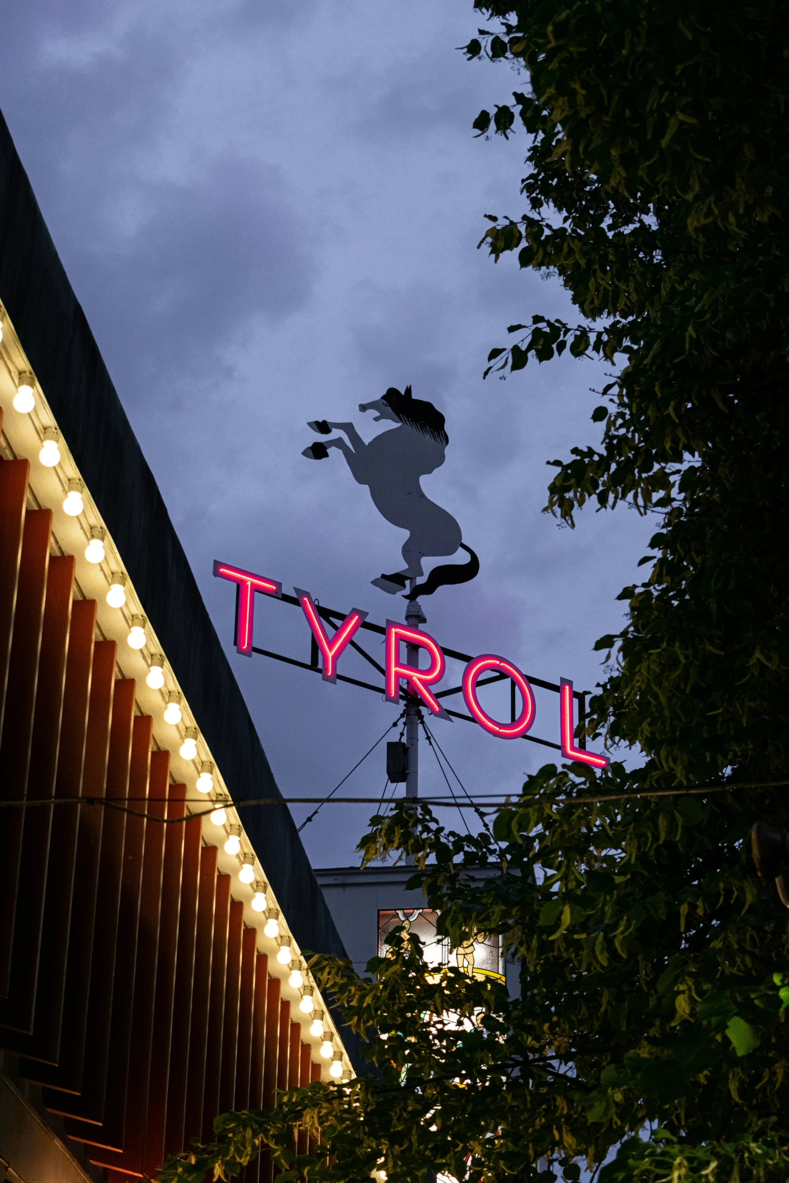 a picture of a person in the air above a building