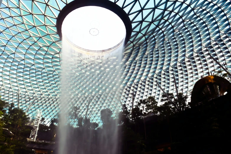 a view of a huge circular glass ceiling at the mall