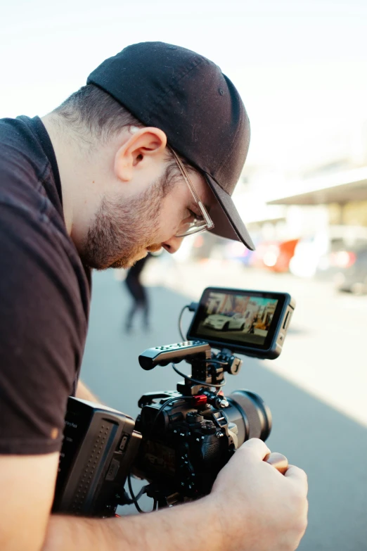 a man is taking pictures with a camera