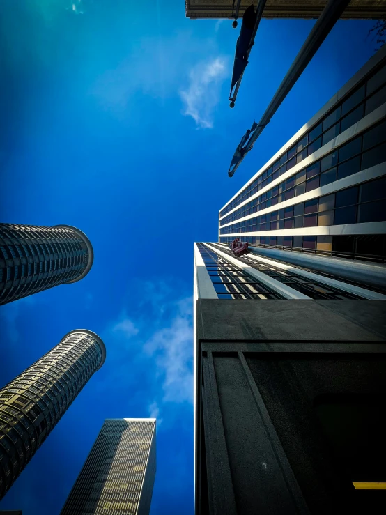 a tall building next to another very tall building