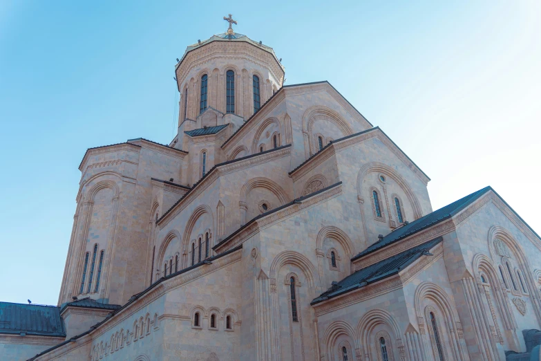 a very tall cathedral with a clock on the roof