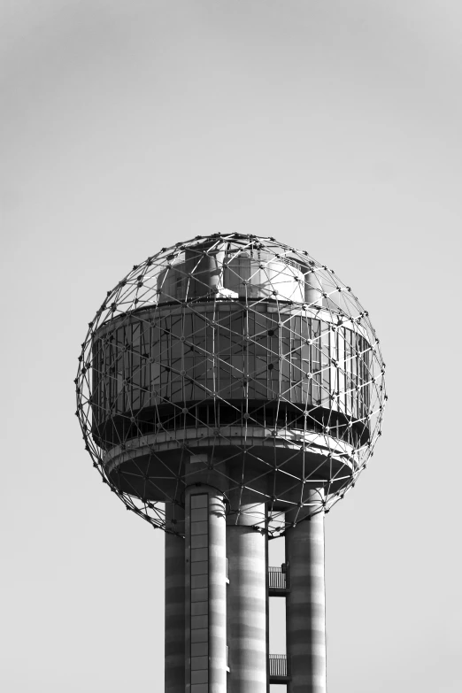 an old water tower is being worked on