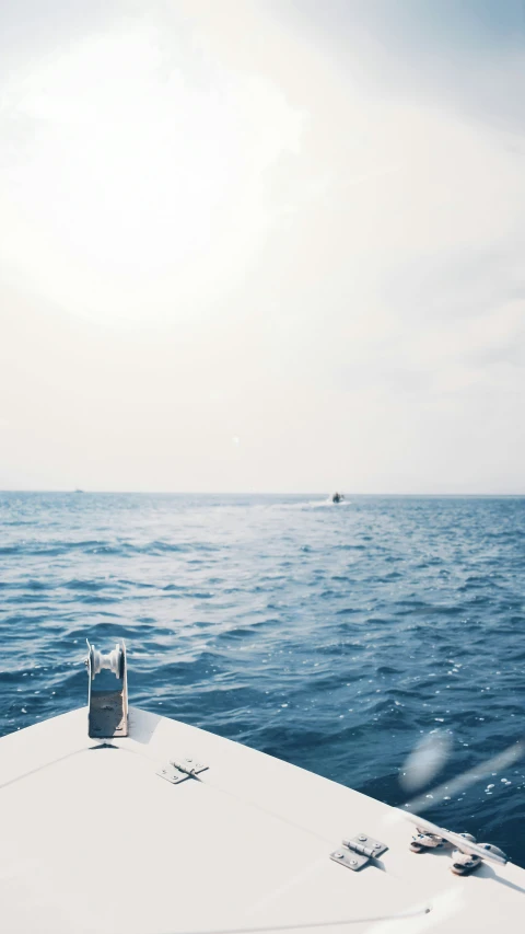 a water view from a sailboat looking out into the ocean