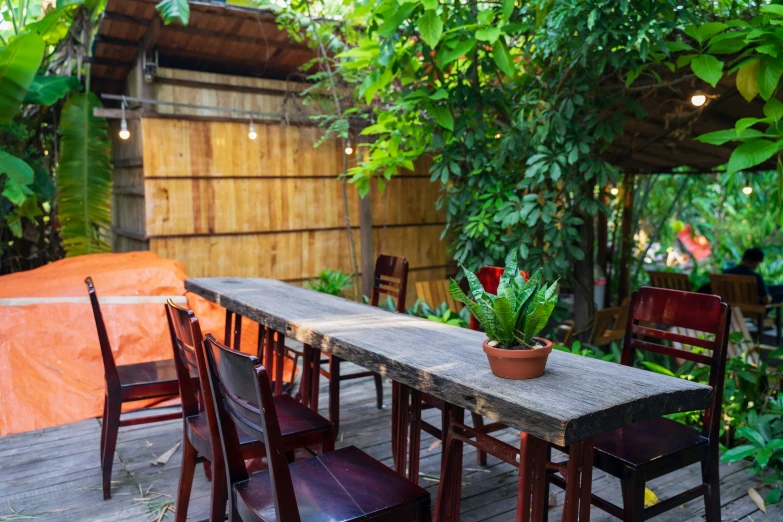 the tables and chairs are made out of wood