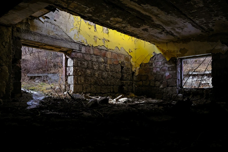 an abandoned room that seems to be very dark