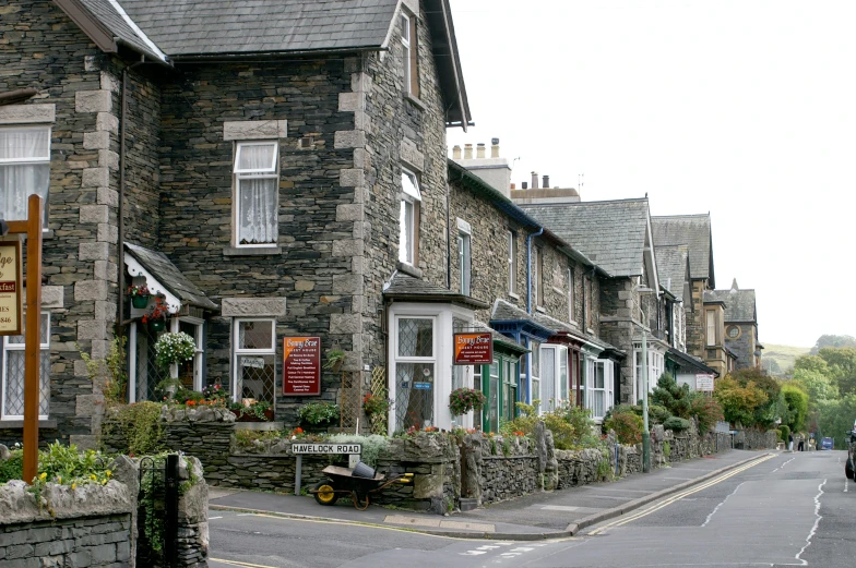 a row of brick town houses on a street