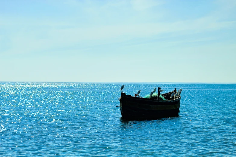 a small boat that is sitting in the water