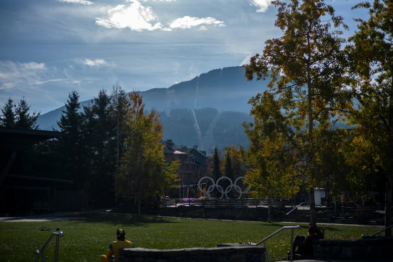 a po of mountains in the distance from a park